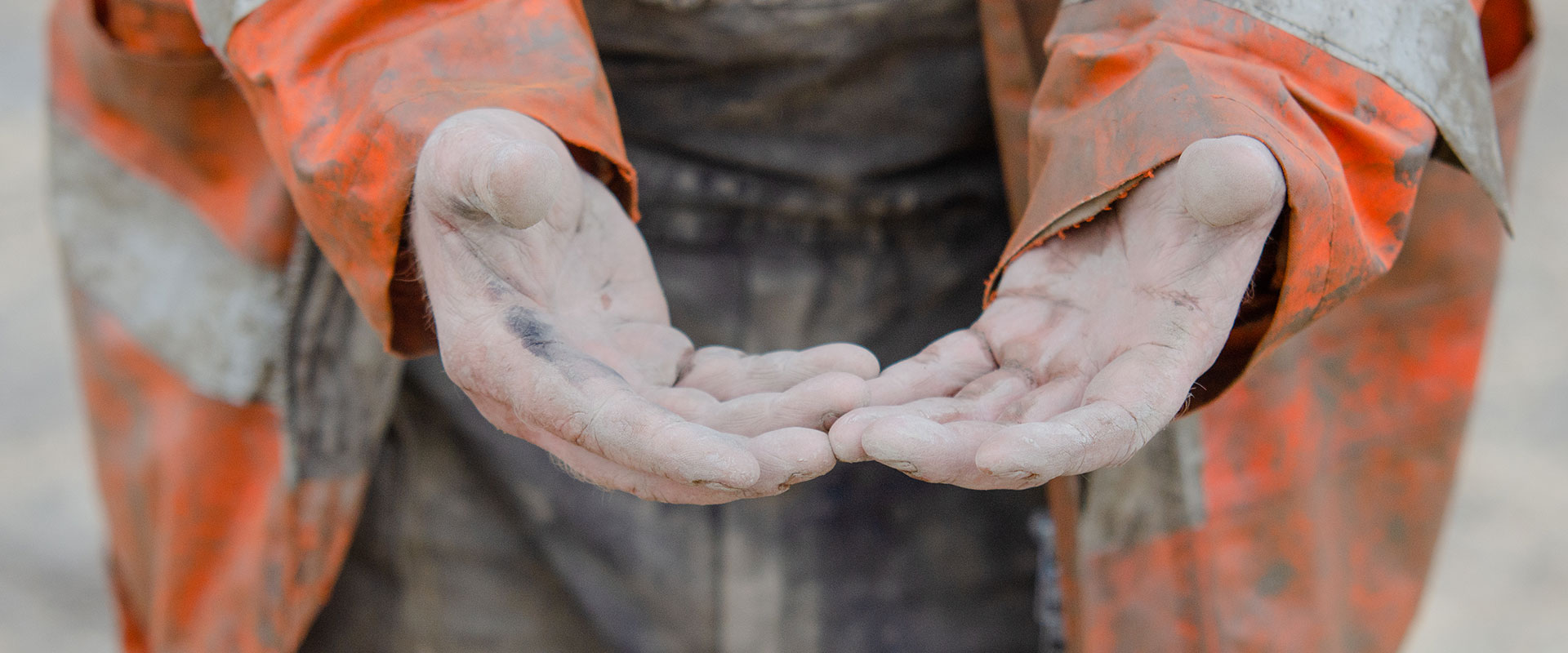 Industrial Worker in Dirty Work Clothes